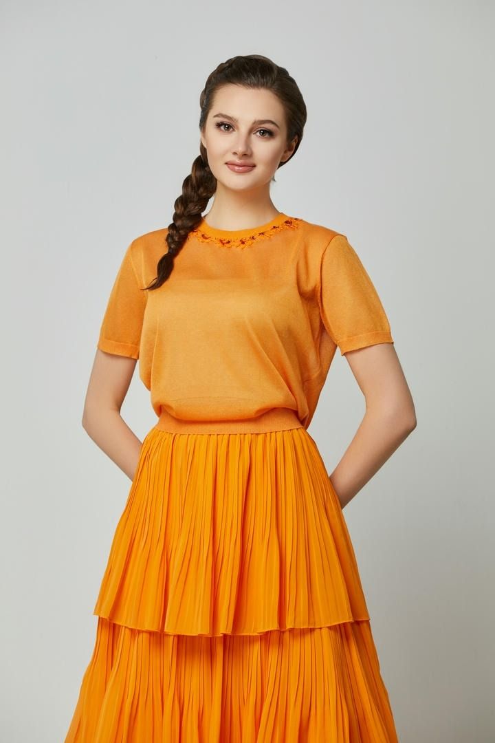 Orange embellished top