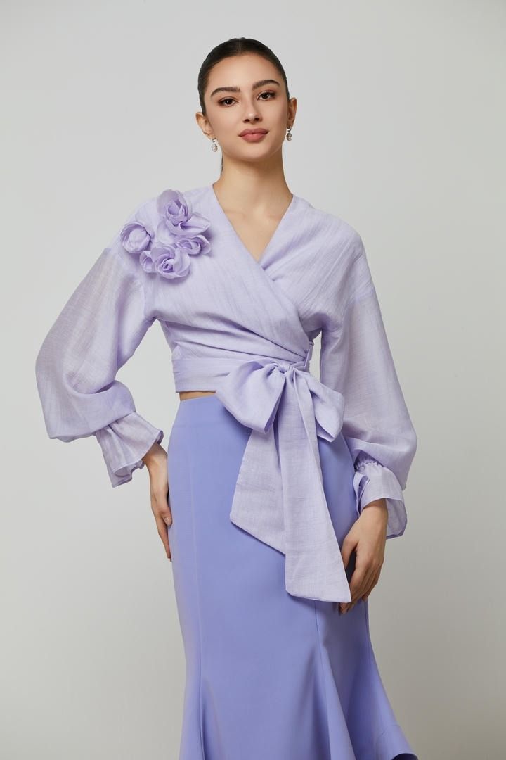 statement bow wrap blouse