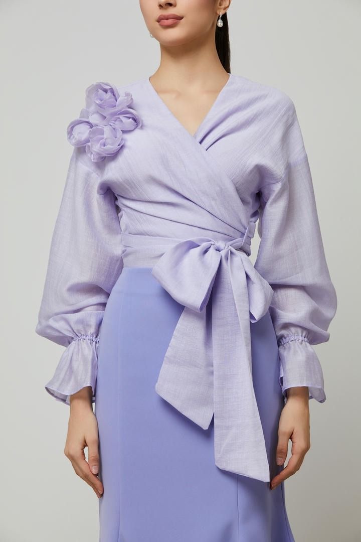 statement bow wrap blouse