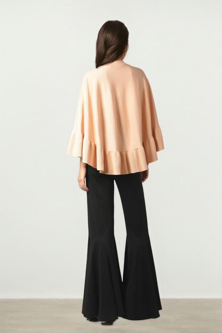 Ruffled Elegance Knit Cape