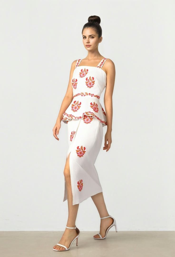 Embroidered Peplum Top
