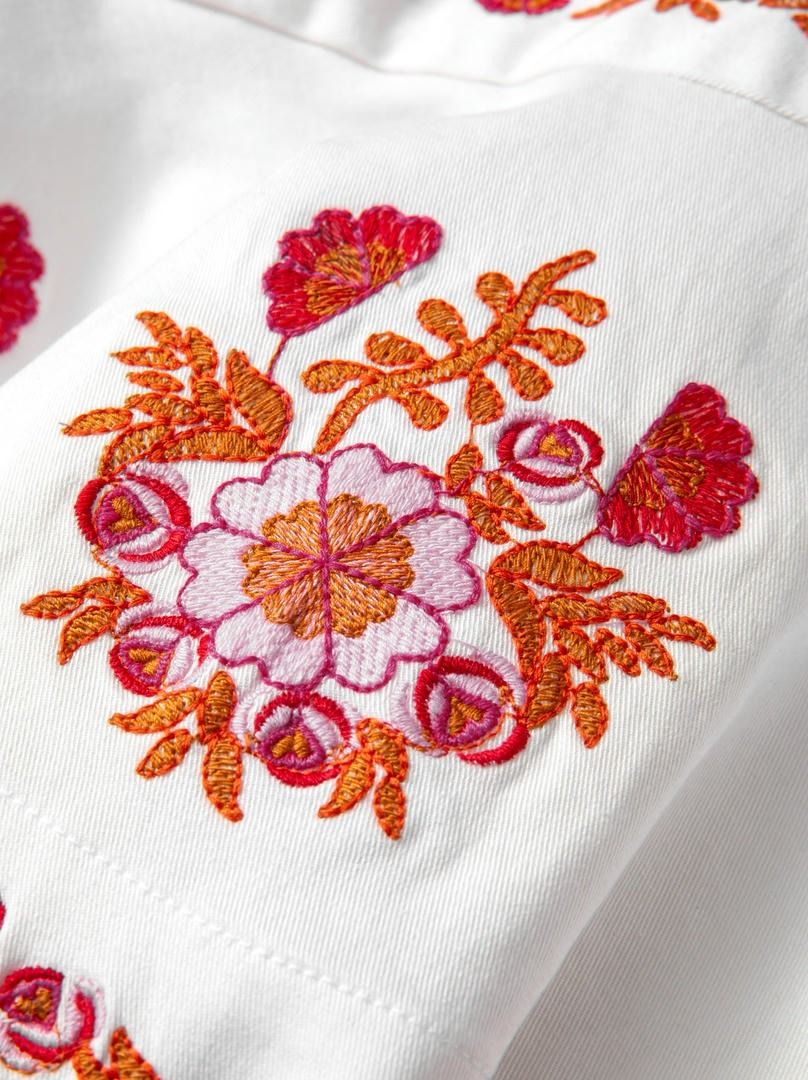 Embroidered Peplum Top
