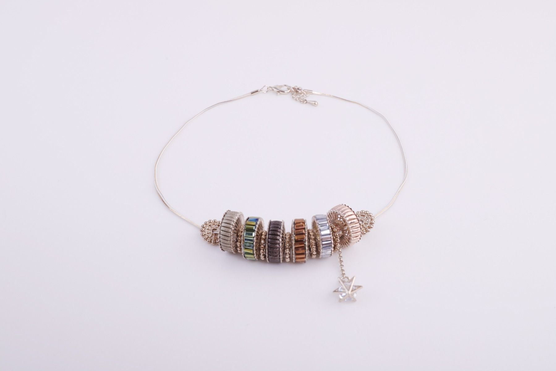 Crystals and steel wheels necklace 