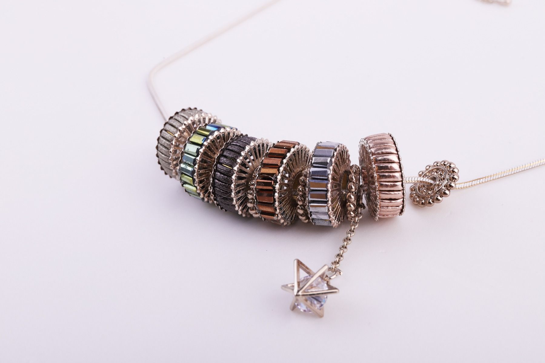 Crystals and steel wheels necklace 